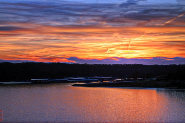 A bright sunset over the lake. Landscape