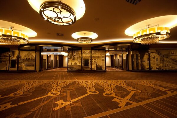 Designer chandeliers on the ceiling. Beautiful interior