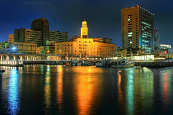 Night city. Beautiful lighting. Reflection in water