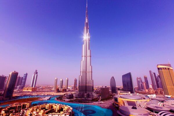 Megapolis from a height on a blue sky background