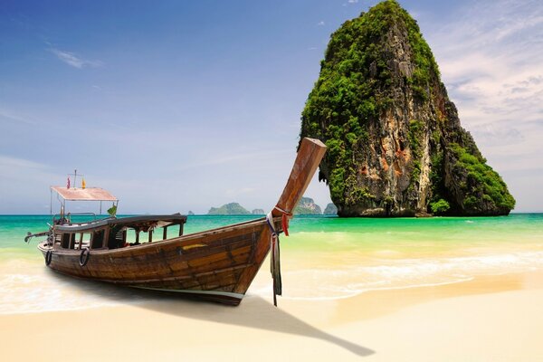 Giant stones in the sea overgrown with greenery