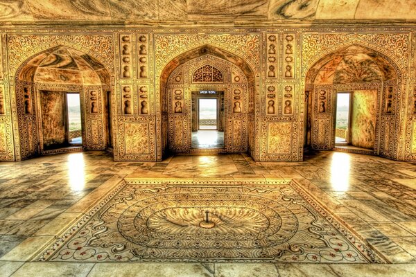 An ancient palace with carved patterns on the walls