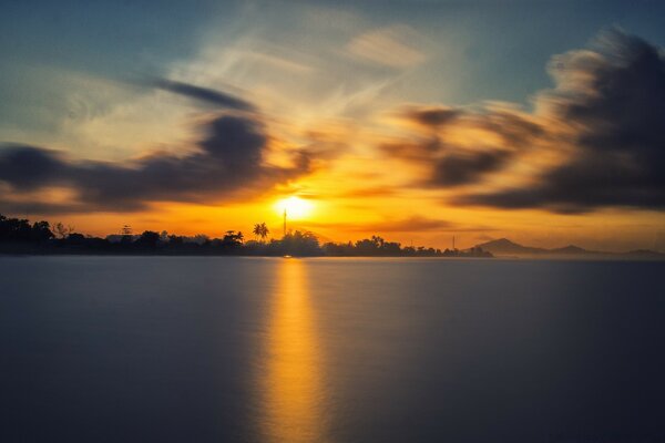 Sunset is reflected in the waters of Asia