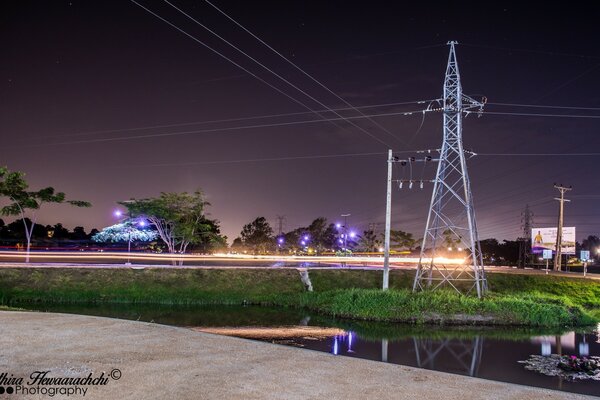 Night urban landscape. Power transmission lines