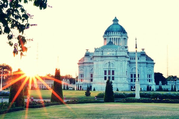 LAWN IN FRONT OF THE TEMPLE-LIKE HOUSE