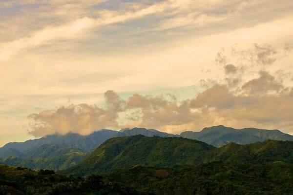 Misty sunset in the mountains of Asia