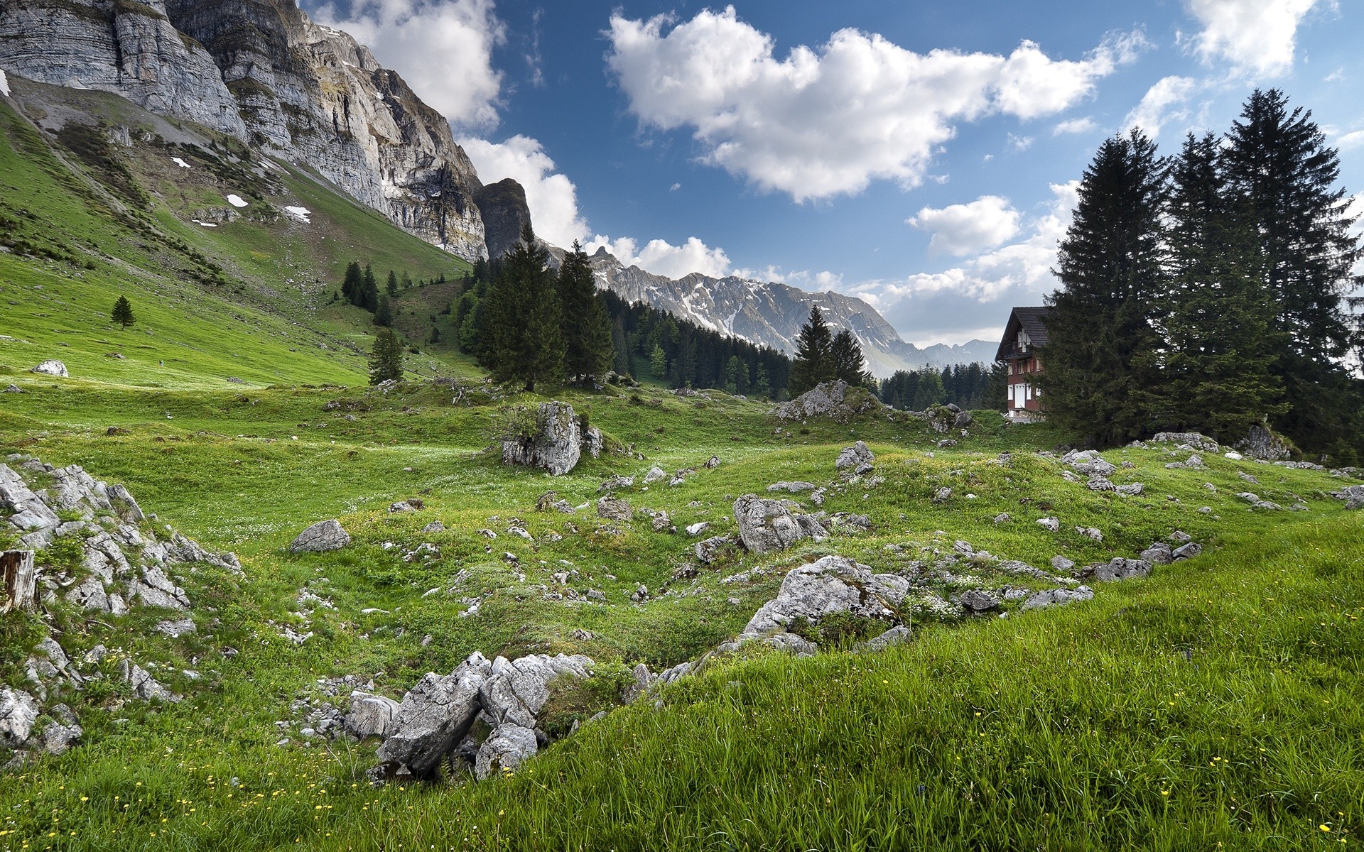 europe landscape mountain nature travel grass outdoors sky hayfield summer valley scenic rock hill mountain peak snow alpine tree wood