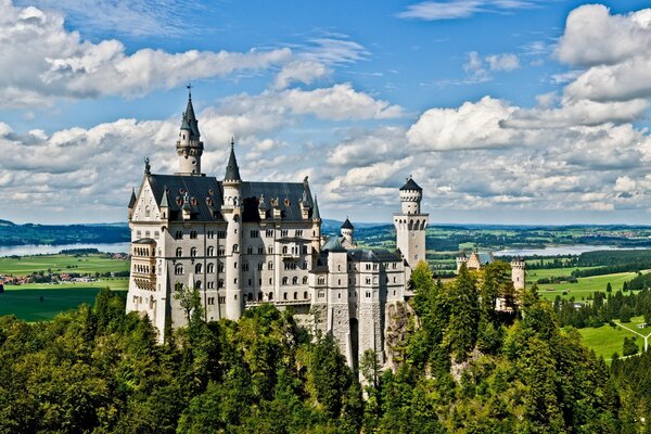 A huge castle on top of a mountain