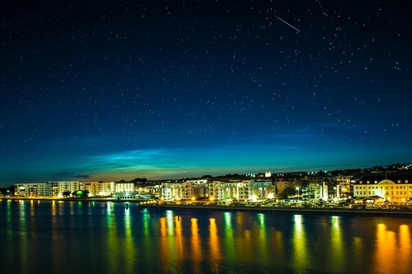 The night city of Europe. Starry sky