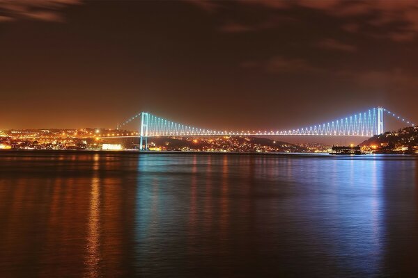 Dusky sunset over a glowing bridge