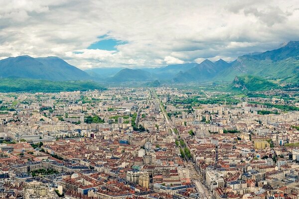 Summer city top view around the mountain