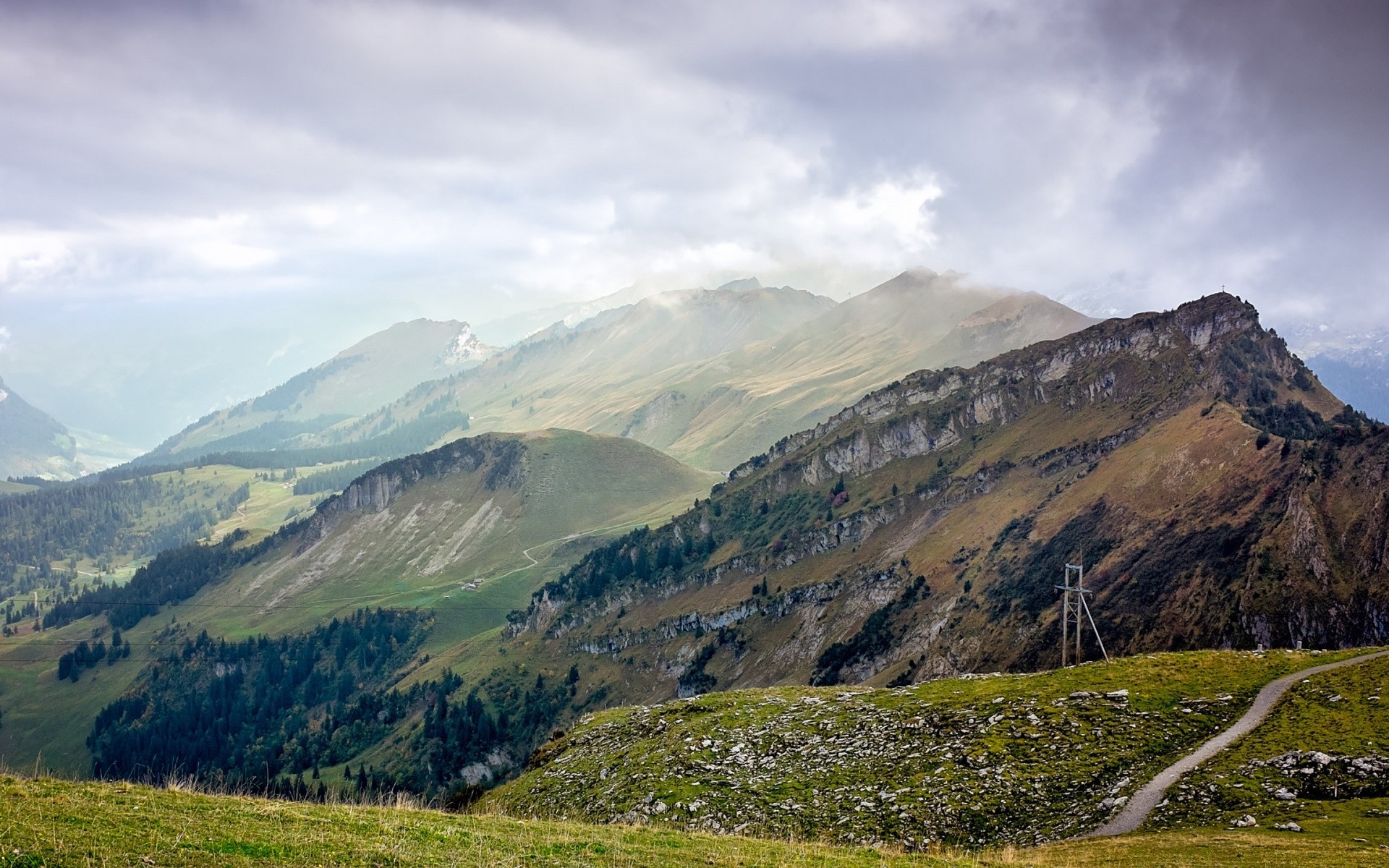 europe mountain landscape travel nature sky outdoors snow valley mountain peak scenic hill grass summer rock tourism hike cloud