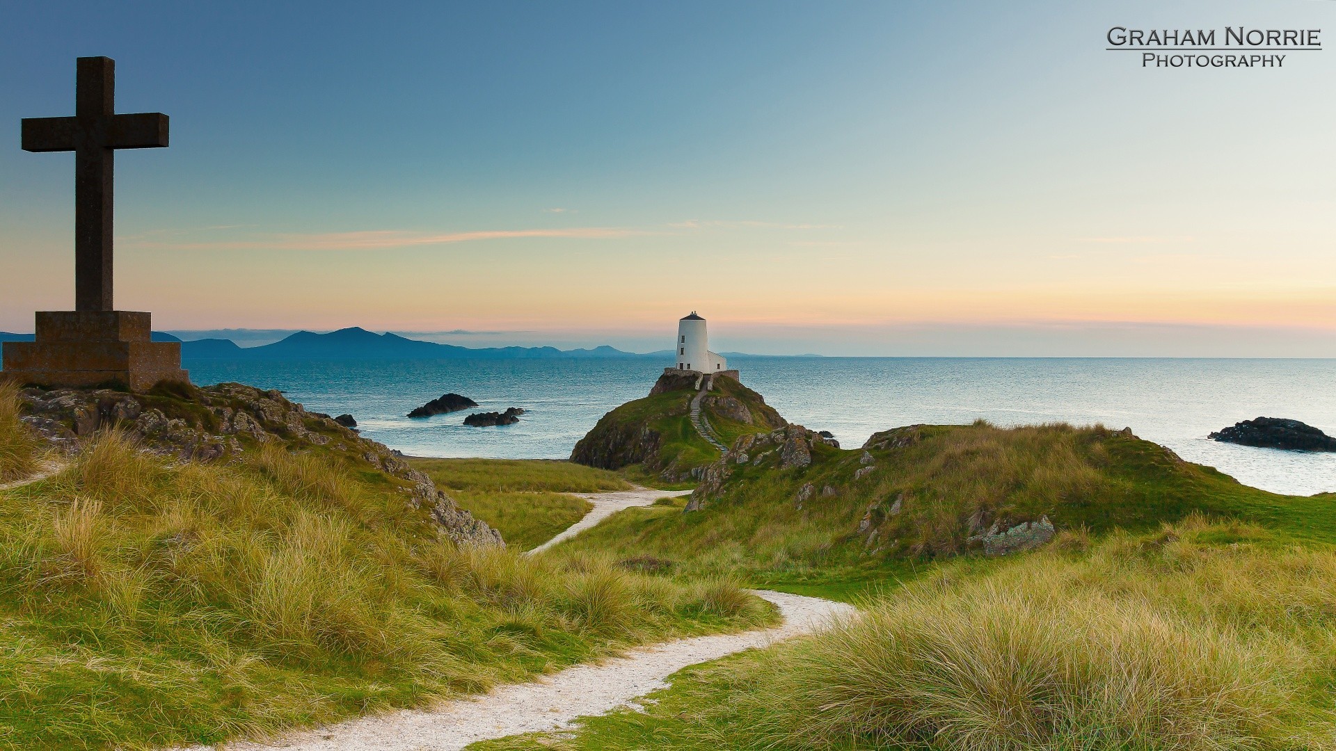 europe phare mer eau mer en plein air voyage paysage ciel plage océan guide herbe nature coucher de soleil lumière du jour rock