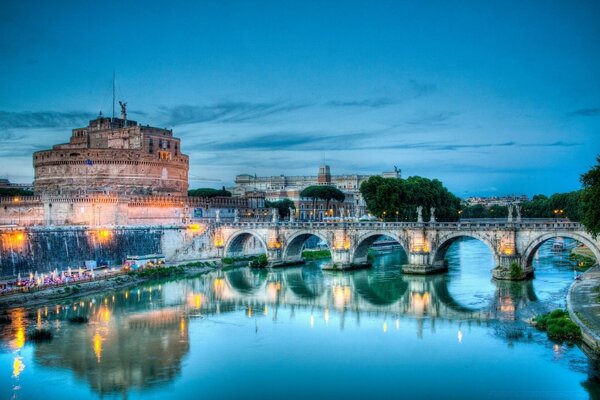 Beautiful old bridge on the background of the city