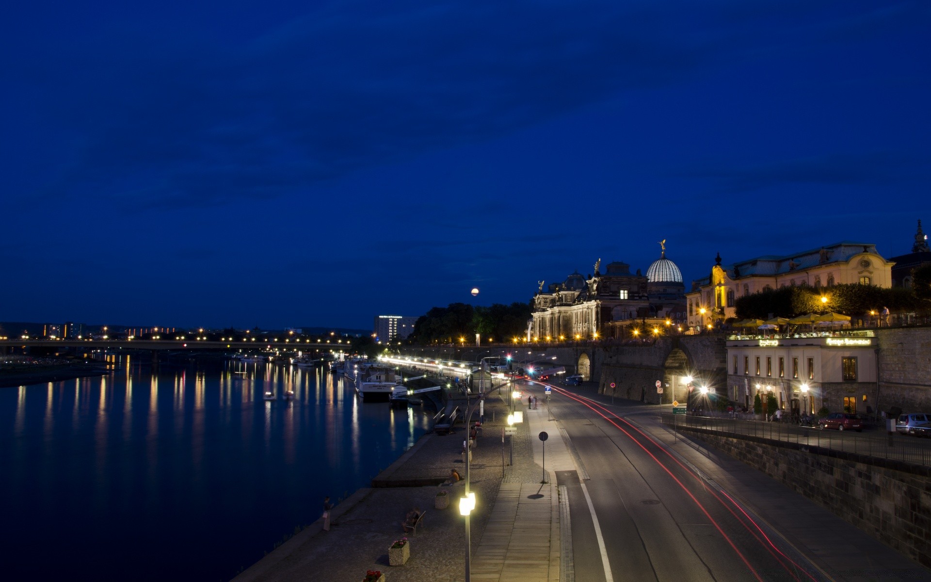 europe city travel dusk sunset evening water architecture street bridge transportation system sky cityscape building urban river light traffic road