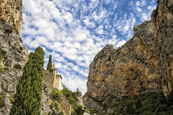 A castle in a magical place on a rock