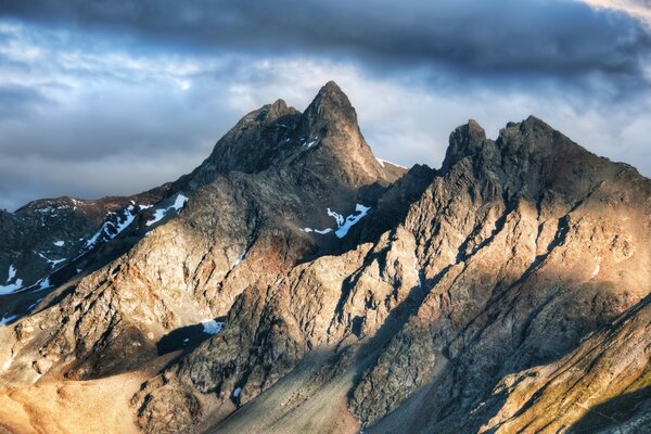 Mountain landscape against a gray sky