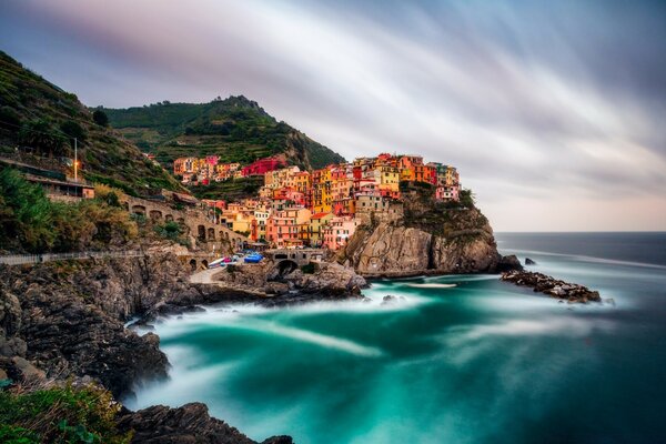 A city on a cliff by the azure sea