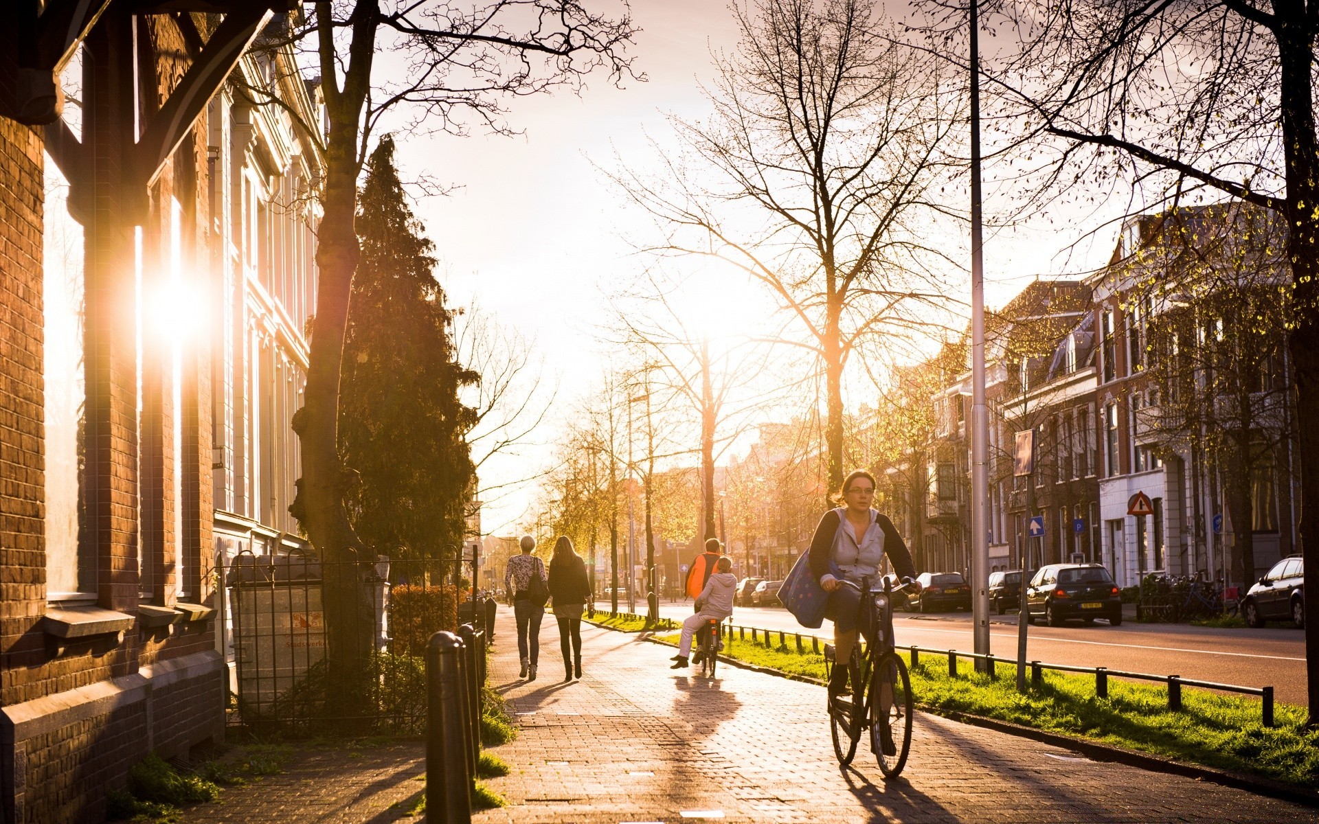 europe street road city tree outdoors urban wheel light park travel pavement