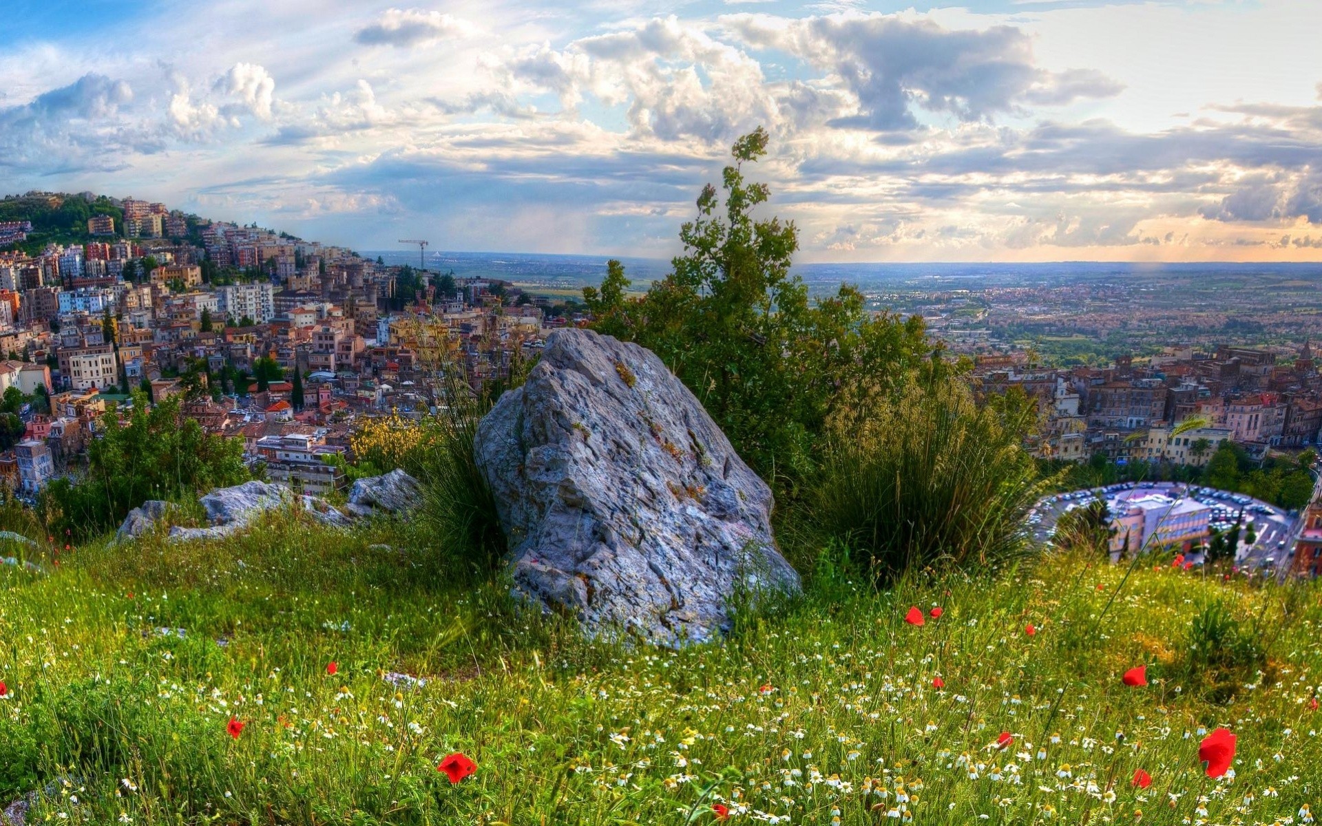 europe landscape travel nature mountain sky outdoors summer sight grass rock flower house scenic tourism architecture building hill hayfield