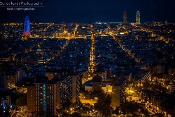 Night city with illumination in the twilight