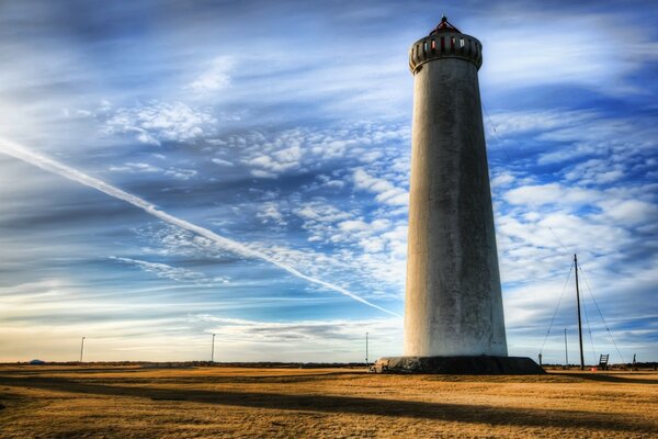 Lighthouse on the background of the morning sky