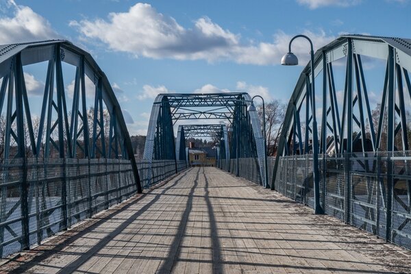 Blue sky over the steel bridge