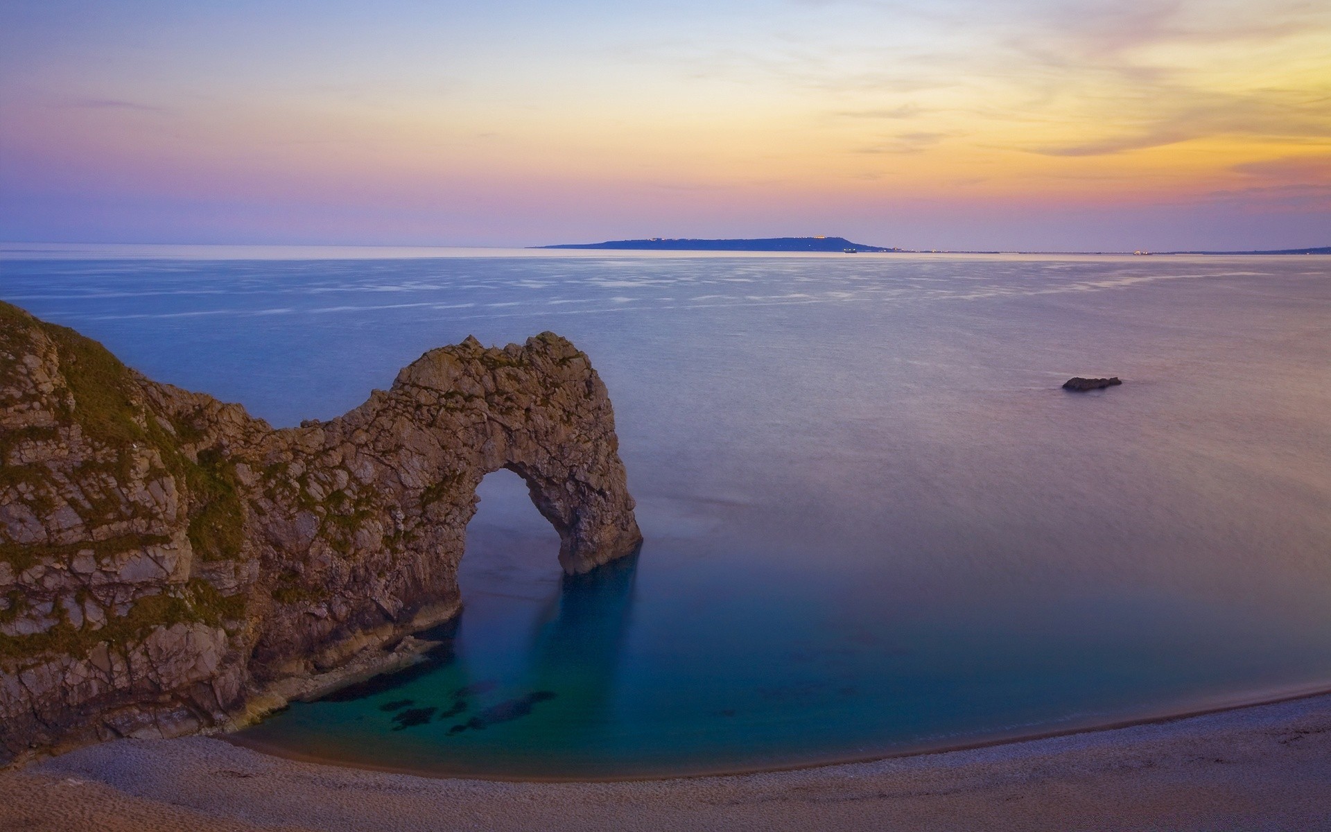 europe plage mer océan mer eau paysage paysage voyage sable coucher de soleil île scénique ciel rock vague vacances rivage