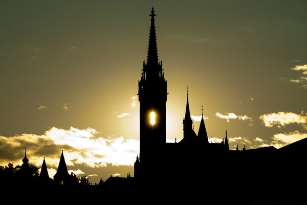 A castle in the twilight and a cloudy sky