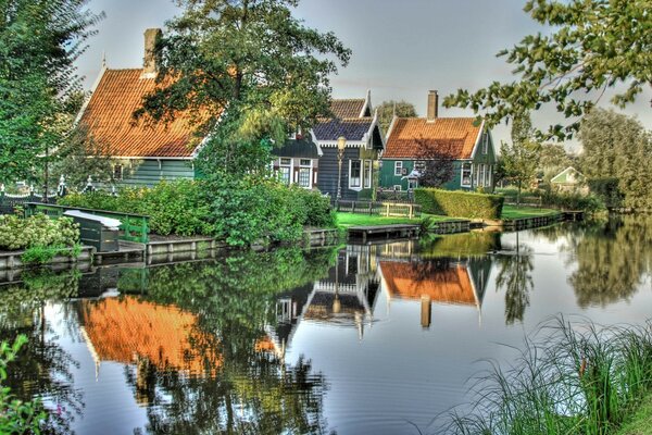 Houses on the shore of a forest lake