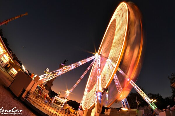 Ferris wheel in the night sky