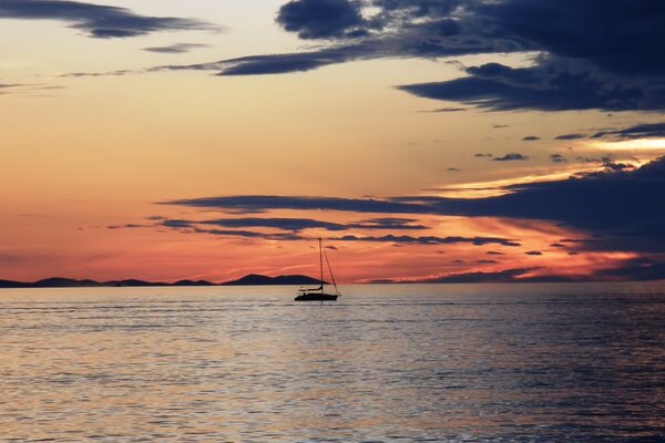 A lonely boat at sunset