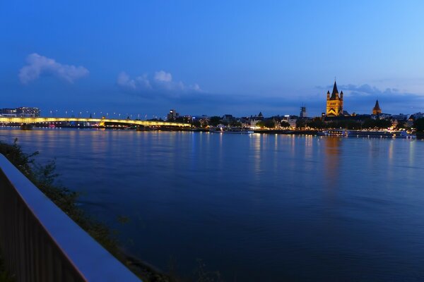 Evening city in the light of street lamps