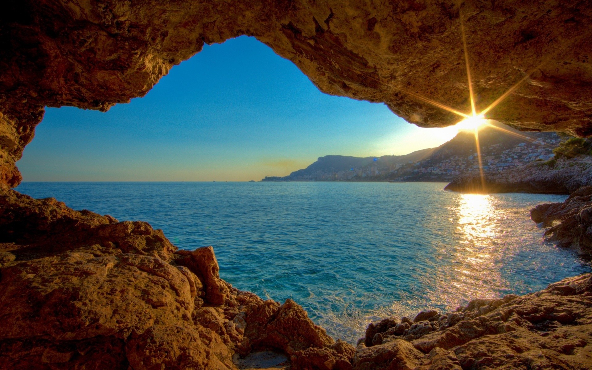 islands water travel sunset sea beach seashore ocean rock landscape evening nature outdoors dawn sky