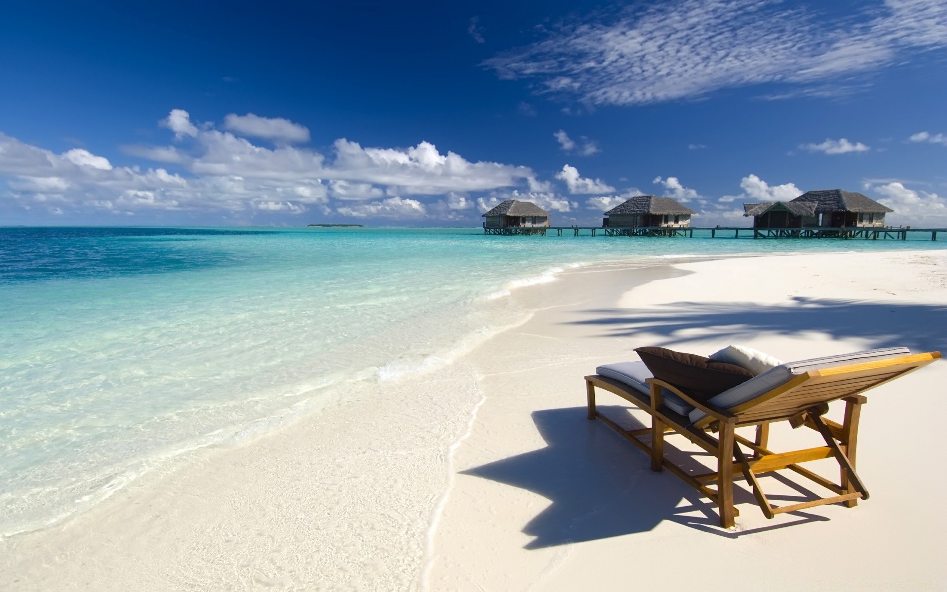 islands beach sand seashore travel tropical water ocean vacation idyllic relaxation sea sun seascape island resort summer fair weather turquoise chair exotic