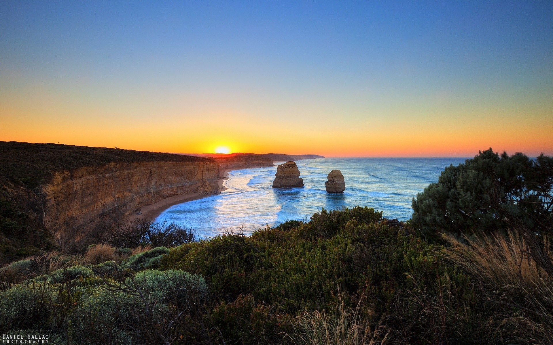 australie et océanie coucher de soleil eau paysage aube plage mer mer crépuscule océan soir ciel paysage voyage nature rock soleil en plein air