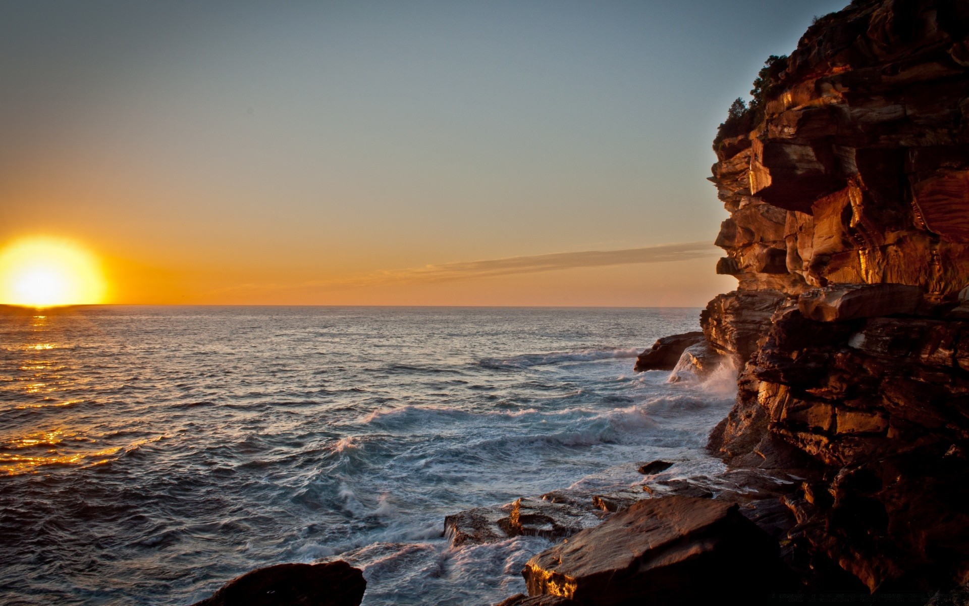 australia and oceania sunset water dawn dusk sun evening beach ocean sea surf seashore sky travel backlit