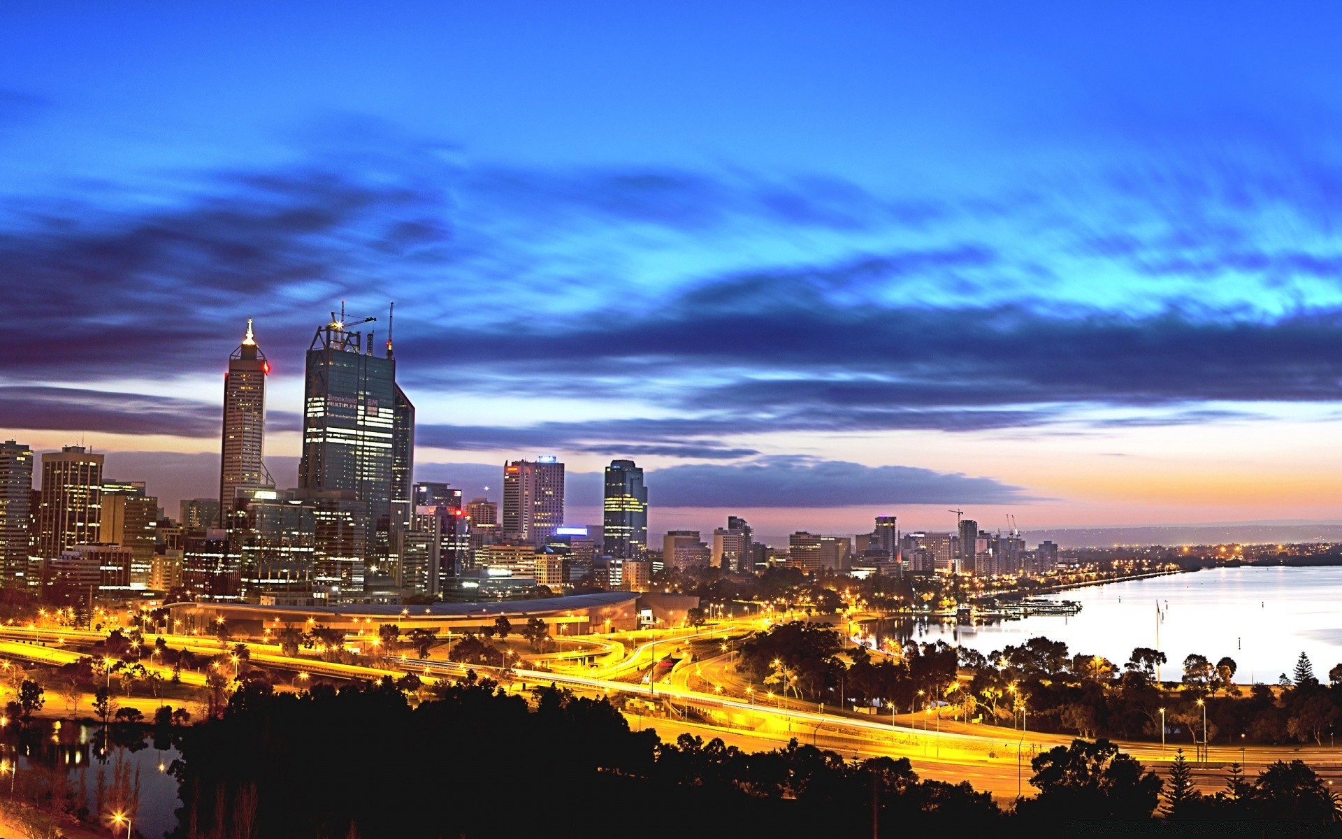 austrália e oceania cidade arquitetura cidade crepúsculo skyline pôr do sol viajar à noite centro da cidade casa céu arranha-céu água iluminado ao ar livre amanhecer panorâmico urbano