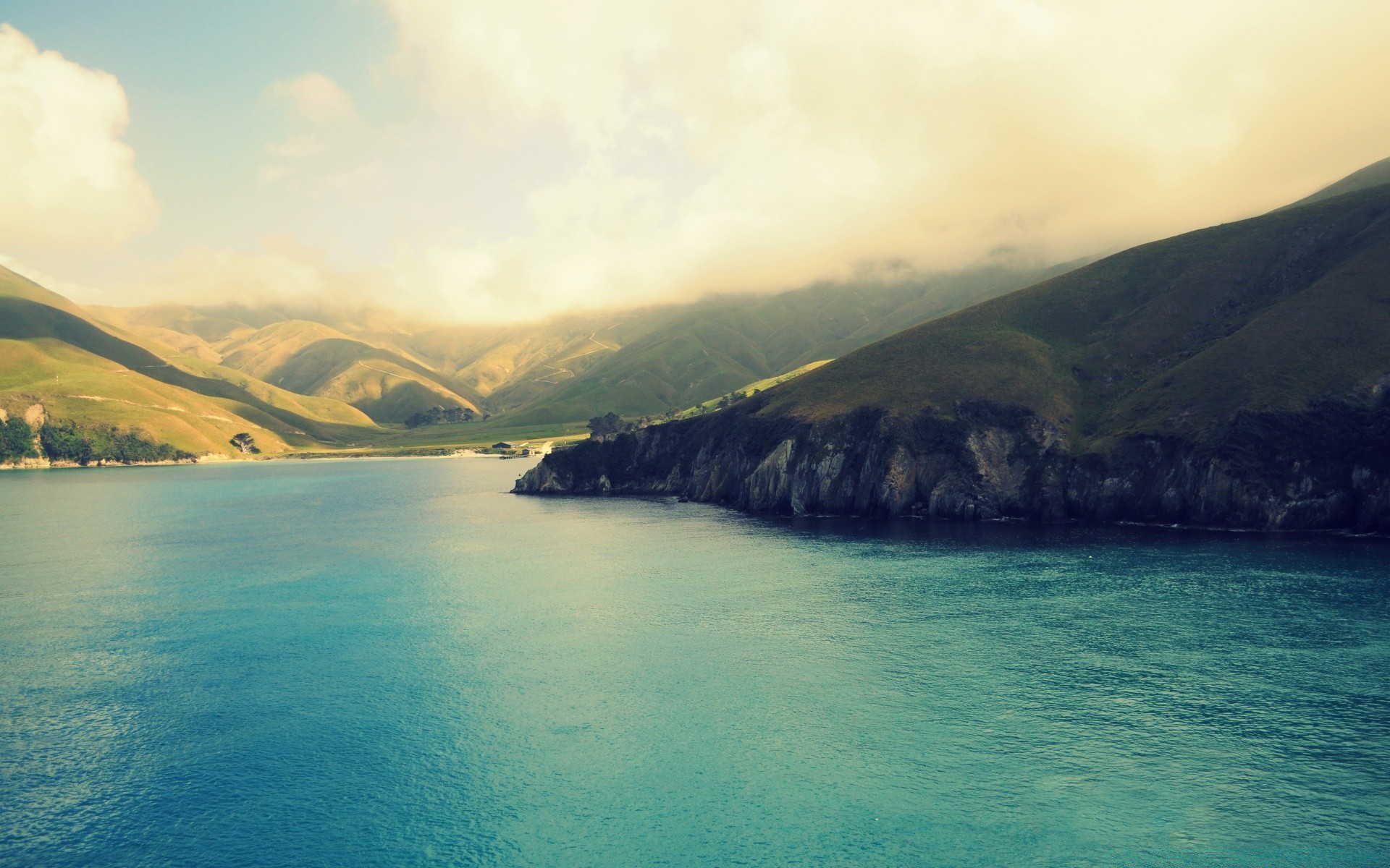 australia and oceania water travel landscape island beach seashore sea nature ocean mountain sky bay seascape