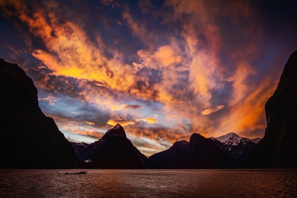 Bright sunset with lake and mountains