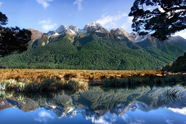 Beautiful pond on the background of mountains