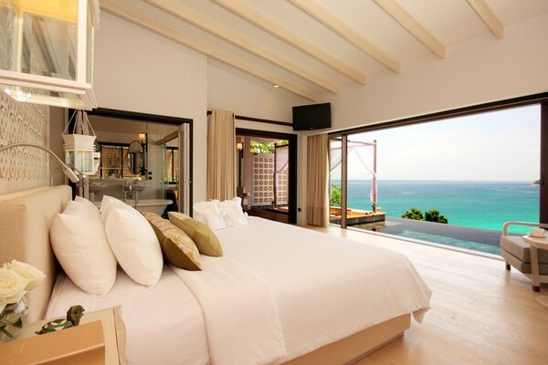 Modern bedroom in the tropics with ocean view